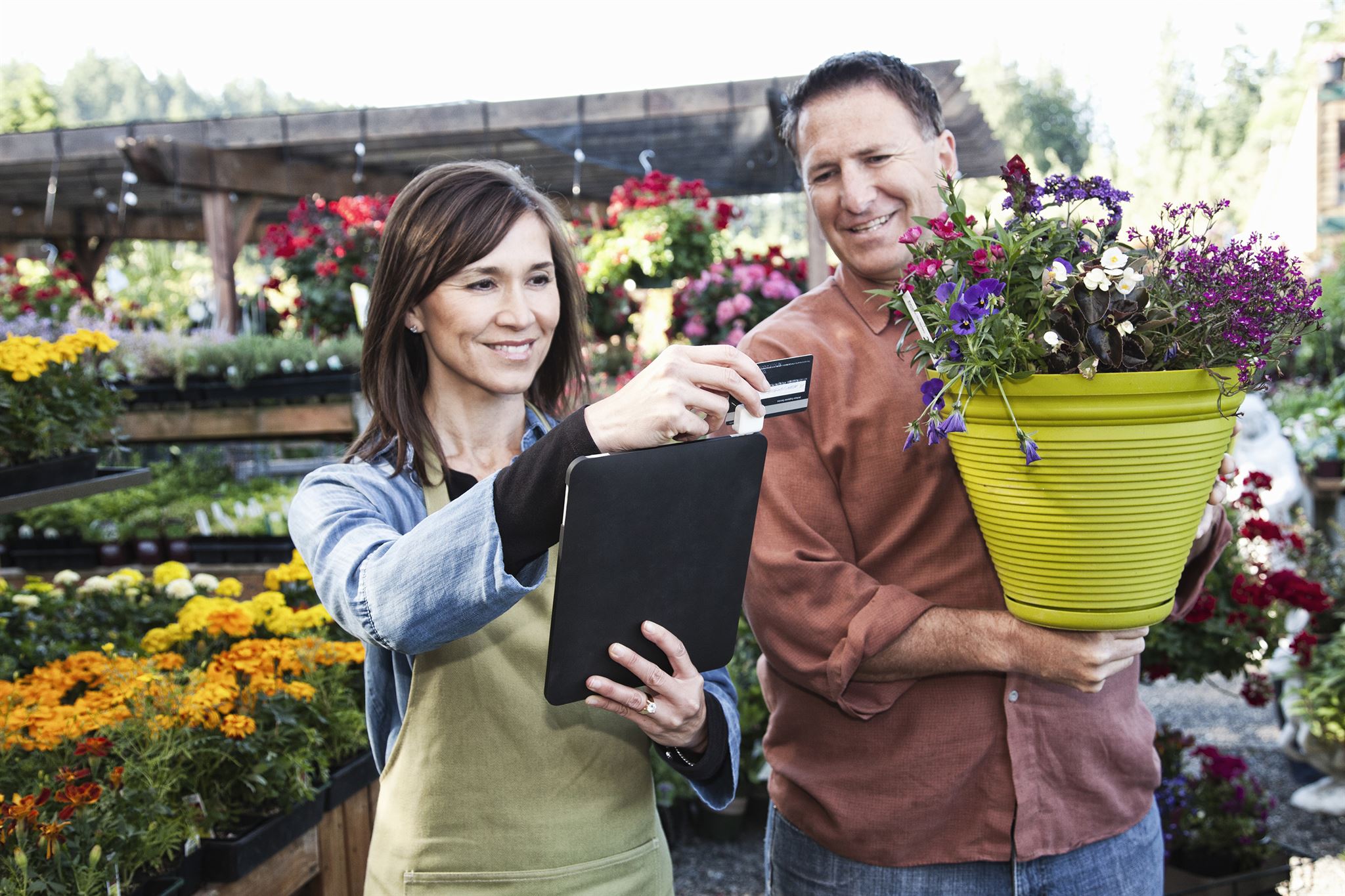 Man-buying-flowers-at-nursery